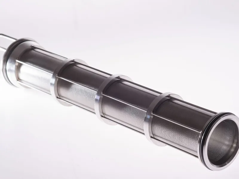 “Cylindrical multi-stage metal filtration assembly with integrated mesh screens on a white background.